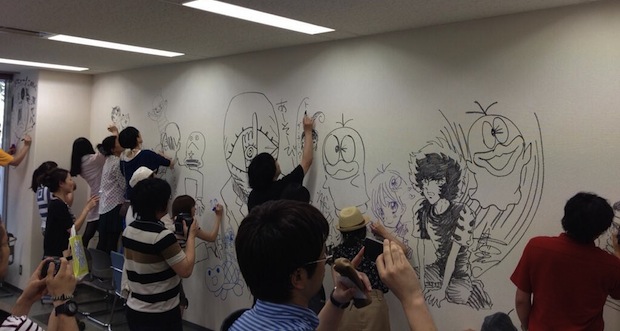 shogakukan manga demolish building comic artists draw walls