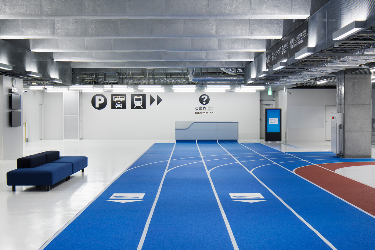 narita international airport terminal 3 lcc budget airline running track design muji furniture party opens