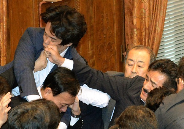 japanese security bills anpo sato masahisa brawl fistfight meme parody