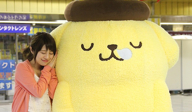 sanrio pompompurin character huggable ad shinjuku station