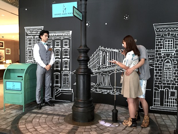 tiffany hand meets hand couples digital installation ginza tokyo